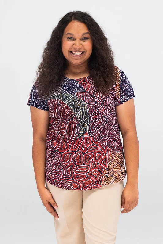 Polo shirt with a hidden pocket for small essentialsOur Many Tribes Women's Fashion Top