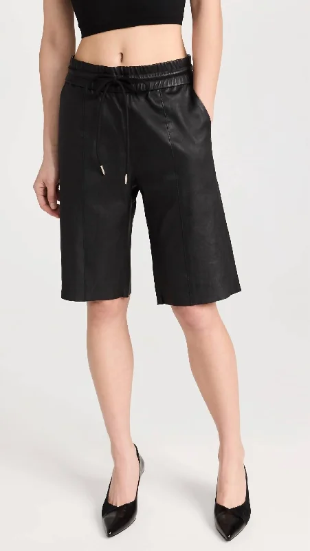 Ruffled Hem Women Shorts to Add a Feminine TouchAll Star Shorts In Black